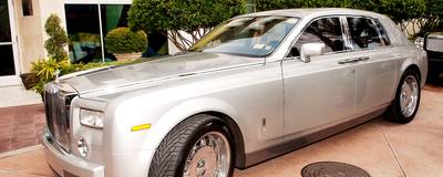 Diddy, Chrome Phantom Drophead Coupe - Smooth as a bottle of Ciroq, Diddy 'rolls' around in this Phantom Drophead Coupe. A departure from his shiny suit days, but still as effortlessly fly, show stopping and flashy.  (Photo: Michael Loccisano/FilmMagic)