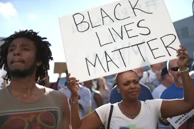 #BlackLivesMatter - Women who were subjected to police brutality were often left out of the #BlackLivesMatter chants. Stay focused and sensitive toward the injustices affecting all African-Americans. (Photo: Joe Raedle/Getty Images)