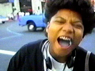 The Evolution of Queen Latifah - Dana Elaine Owens was born in East Orange, New Jersey, to a schoolteacher mom and a police officer dad. She found her stage name, Latifah, meaning "delicate" and "very kind" in Arabic, in a muslim book of names at the age of 8. She caught the entertainment bug early, singing “Home” from the musical&nbsp;The Wiz&nbsp;in a high school play.(Photo: WENN)