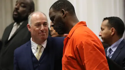CHICAGO, IL -  SEPTEMBER 17:  Singer R. Kelly appears standing beside his attorney, Steven Greenberg during a hearing at the Leighton Criminal Courthouse on September 17, 2019 in Chicago, Illinois.  Kelly is facing multiple sexual assault charges and is being held without bail.   (Photo by Antonio Perez - Pool via Getty Images)