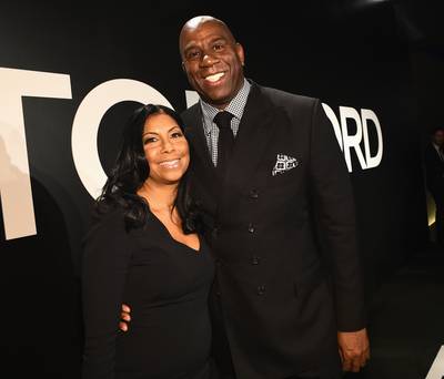 Date Night - Cookie and Magic Johnson make a stylish pair at the Tom Ford show.  (Photo: Michael Buckner/Getty Images for Tom Ford)