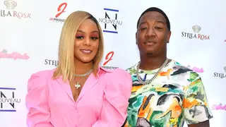 Kendra Robinson and Yung Joc attend Nouveau Bar & Grill Celebrity Grand Opening at Nouveau Bar & Grill on July 25, 2021 in Jonesboro, Georgia. 
