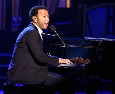 An Evening of Stars Timeline - Sept. 22, 2007: Avid acitivist and prolific songwriter John Legend tickles the ivory keys for a good cause.&nbsp;(Photo: Trish Tokar/Getty Images)