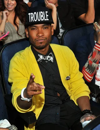 No More Mr. Nice Guy - Crooner Miguel, seated in the audience at the 2011 MTV Video Music Awards, rocks a highlighter-yellow cardigan, a five o'clock shadow and an advertisement on his baseball cap that says he wants to be R&amp;B's newest &quot;bad boy.&quot; (Photo: Mark Davis/PictureGroup)
