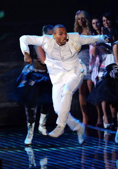 Celebrities: Chris Brown wearing Christian Louboutin Leopard Sneakers