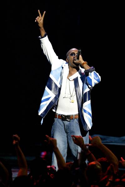 Nas - Outkast, Aaliyah, TLC and now Nas? Are you seeing a trend of heavy hitters? Nas gave the crowd a performance of his It Was Written single “Street Dreams.” (Photo: GARY HERSHORN/Landov)