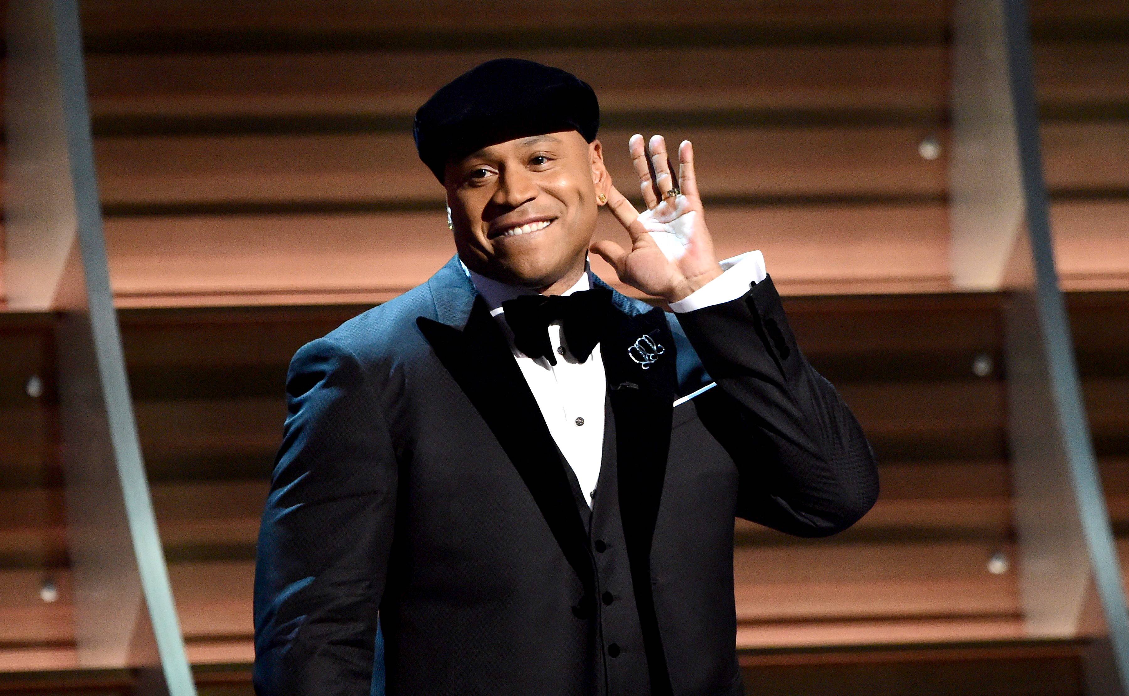 The 2016 GRAMMY Awards - The award show that's all about music excellence went all out in pairing performers that would get us talking. LL Cool J, of course, took his hosting duties like the seasoned pro he always is. We got an incredible performance by Kendrick Lamar and other artists. Sadly, we were also reminded of how many great artists we lost over the year with many tribute performances. Come with us as we remember Grammy 2016 night. – Jon Reyes(Photo: Robyn Beck/AFP/Getty Images)