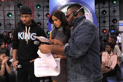Great Job - Show producer Jeremy reviews show notes with Rocsi Diaz and Terrence J at 106 &amp; Park, December 30, 2011. (photo: John Ricard / BET)