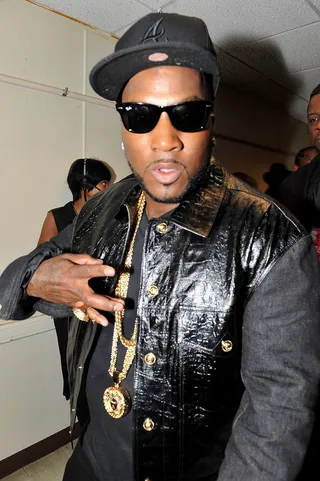 Takin' It There - Jeezy took a minute to stunt for the cameras backstage before joining Wiz Khalifa onstage for the smash hit &quot;Work Hard, Play Hard.&quot; If anyone knows about hard work paying off, it's Jeezy!&nbsp; (Photo: Moses Robinson/Getty Images for BET)