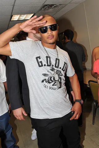 King Amongst Kings - Rather than throw up the peace sign, T.I. gave a hearty salute to cameras backstage.(Photo: Moses Robinson/Getty Images for BET)