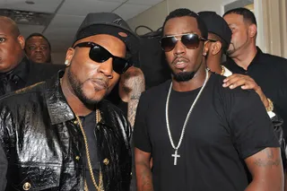 Color Coordination - Young Jeezy and Sean Combs, 'P. Diddy' chop it up back stage. Clearly the theme of the evening is black apparel, shades and modest chains.(Photo: Moses Robinson/Getty Images for BET)