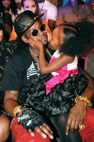 Proud Parent - Although he claims to want one thing for his birthday, the reality is 2 Chainz is a loving father who clearly enjoys spending time with his daughter. Not only did he keep her entertained during the show, he walked the red carpet with her.(Photo: Chris McKay/Getty Images for BET)