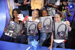 Monster - Audience members with Monster headphones given to every member of the livest audience at 106 &amp; Park, September 26, 2012. (photo: John Ricard / BET).