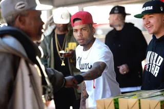 'Tis the Season - Kid Ink participates in WorldStarHipHop's 3rd Annual Skid Row Holiday Giveaway in Los Angeles.(Photo: Charley Gallay/Getty Images for WorldStarHipHop)