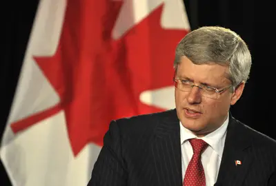 PM Wades Into the Crack Mayor Fiasco - Canada’s Prime Minister Stephen Harper has finally spoken out about the under-fire, crack-smoking mayor of Toronto, Rob Ford. Following Ford’s most recent calamity in which he pushed a council member to the floor during a meeting to strip him of his powers, Harper called Ford’s behavior “troubling.”The prime minister added that his office does not condone the illegal use of drugs.(Photo: Stuart Davis/Bloomberg via Getty Images)