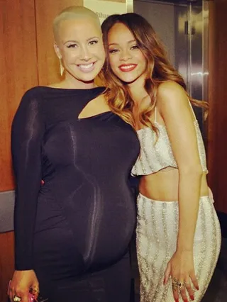 Amber Rose @muvarosebud - Rihanna snuggles up to&nbsp;Amber Rose's baby bump at the the Grammys. Rose's belly looks like a little Wiz might pop out any day now.&nbsp;(Photo: instagram/muvarosebud)