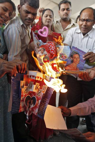 India's Bhariya Janta Party - In Southern India, members of a Hindu political party appealed to young people, asking them to denounce the holiday and staged a protest where they burned greeting cards.&nbsp;(Photo: REUTERS/Amit Dave)