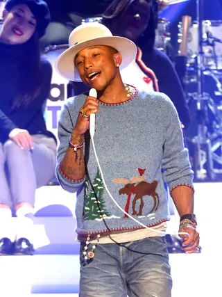 Pharrell Williams - It looks like Pharrell’s infamous hat had to share its attention with Pharrell’s ugly Christmas sweater. New traditions?(Photo: Frederick M. Brown/Getty Images)