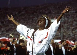 Her Performances - Whitney turned in some of the most memorable performances of all time during her 48 years with us. Her television debut on the Merv Griffin Show in 1983; “The Greatest Love of All” at the 1987 Grammys; and of course, her legendary take on “The Star-Spangled Banner” at the Super Bowl in 1991.(Photo: George Rose/Getty Images)
