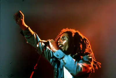 Bob Marley - Grammy Award-winning Jamaican singer-songwriter Bob Marley wrote politically charged songs that made him renown as the first third world pop star. As the primary musical voice of dissension in his hometown of Jamaica, Marley's music will remain on protestor's playlists. (Photo: Michael Ochs Archives/Getty Images)