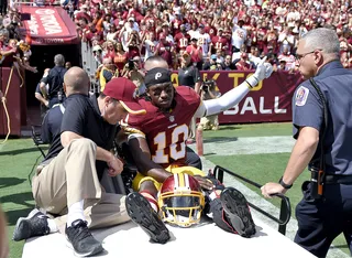 Robert Griffin III Dislocates Ankle - The good news: the Washington Redskins stomped all over the Jacksonville Jaguars&nbsp;41-10 for their first win of the season. The bad news: Redskins quarterback Robert Griffin III dislocated his ankle in the first quarter and an MRI on Monday could spell him missing the rest of the season.&nbsp;(Photo: Nick Wass/AP Photo)