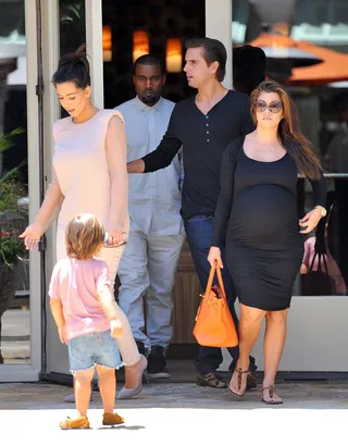 Meet the Family - Kanye met the entire Kardashian clan at Kourtney Kardashian's baby shower in May 2012. Looks like the tight-knit family give the new couple their seal of approval!&nbsp; (Photo: WENN)