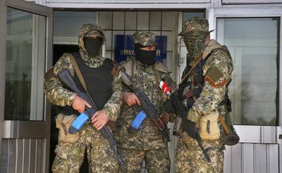 Another Building Seized - On Monday, April 28, pro-Russian separatists captured a government building, raising the flag of the self-proclaimed &quot;Donetsk Republic&quot; in the eastern Ukraine town of Kostyantynivka. Reports have also claimed that the group is in control of the town's police station.(Photo: AP Photo/Sergei Grits)