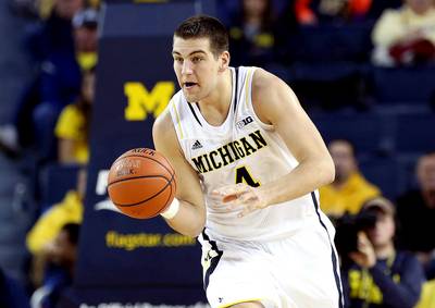 Michigan's Mitch McGary Enters NBA Draft After Failed Drug Test - Facing a looming one-year NCAA suspension for a positive marijuana drug test, Michigan's Mitch McGary&nbsp;has announced that he's entering the 2014 NBA Draft.&nbsp;&nbsp;(Photo: Leon Halip/Getty Images)