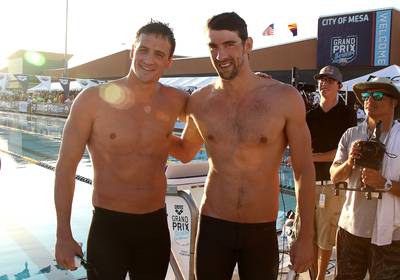 Michael Phelps Falls to Ryan Lochte - In his comeback swimming meet at the Arena Grand Prix in Mesa, Arizona, on Thursday, Michael Phelps was edged by Ryan Lochte in the 100-meter butterfly final.(Photo: Christian Petersen/Getty Images)