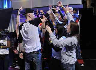 It's Like That - Machine Gun Kelly jumps into the audience to greet fans in the middle of his interview at 106 &amp; Park, February 10, 2012. (Photo: John Ricard / BET)