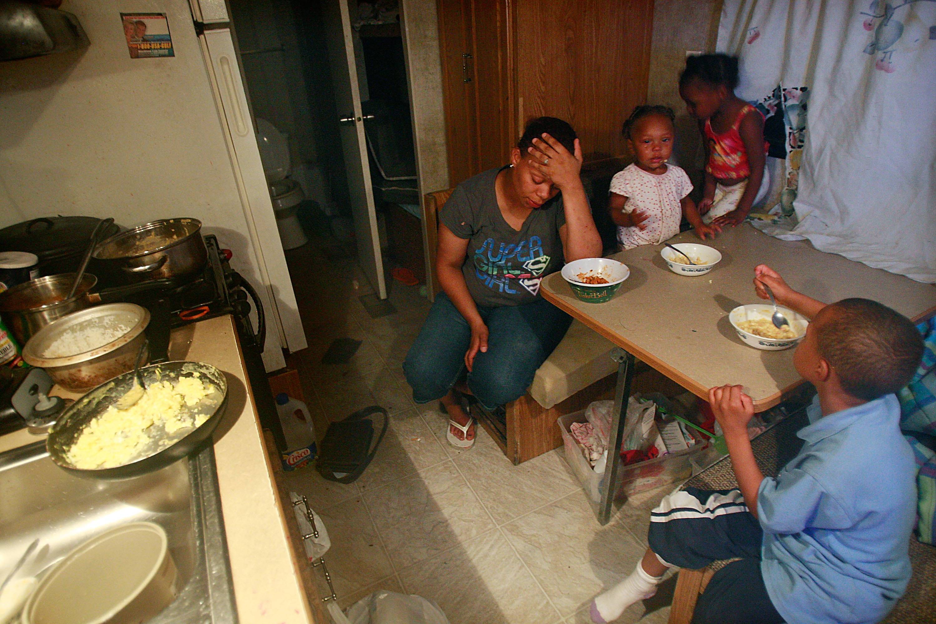 Income Disparities - $32,229: the annual median income of Black households in 2011, a decline of 2.7 percent from 2010. Source: U.S. Census Bureau, Income, Poverty and Health Insurance Coverage in the United States: 2011. &nbsp;(Photo: Mario Tama/Getty Images)
