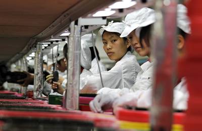 Chinese Workers Revolt Over 2-Minute Bathroom Breaks - Hundreds of Chinese factory workers grew intensely angry about strictly timed bathroom breaks and fines for starting work late.  &nbsp;&nbsp; (Photo: REUTERS/Bobby Yip)