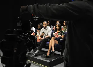 Right Here - Rocsi Diaz and Terrence J check out a scene from the new Denzel Washington film, "Safe House," at 106 &amp; Park, February 7, 2012. (Photo: John Ricard / BET)