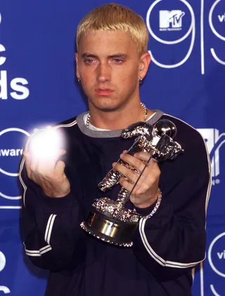 Eminem - Slim Shady was being his old troublesome self back in 1999 while attending the MTV Video Music Awards.&nbsp;(Photo: &nbsp; Dave Hogan/Getty Images)