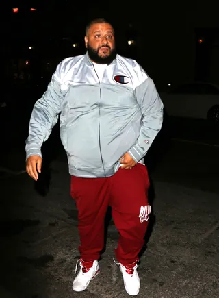 DJ Khaled - DJ Khaled rolls up in a blue Rolls Royce to Beauty and Essex in Hollywood. His Champion track wear is on-point.&nbsp;(Photo: MHD, PacificCoastNews)