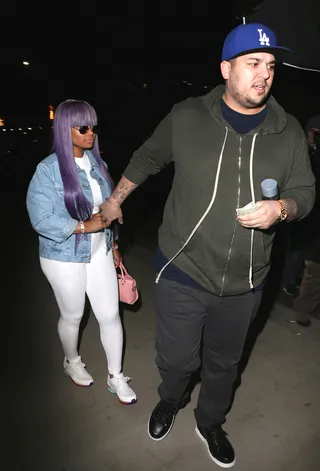 Blac Chyna and Rob Kardashian - Blac Chyna and Rob Kardashian&nbsp;seem to be back together yet again as they were seen leaving Tao restaurant in Hollywood, walking hand in hand. The two have reportedly been split up for some time. (Photo: MHD, PacificCoastNews)