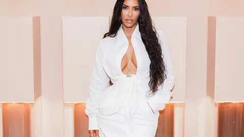 Kim Kardashian wears a tiny thong bikini.
