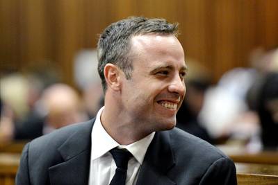 Olympic Sprinter Oscar Pistorius Pleads Not Guilty - South African Olympic sprinter Oscar Pistorius, who is accused of killing his girlfriend, pled not guilty as his murder trial opened on Monday. A witness testified to hearing screams before a series of four gun shots rang out. &nbsp;(Photo: Herman Verwey /AP Photo/Media24-Pool)