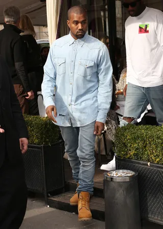 Lunch With Yeezy - Kanye West&nbsp;looks fresh in light colored denim and Timbs as he leaves L' Avenue restaurant in Paris.&nbsp;(Photo: KCS Presse/Splash News)