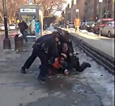 Video of NYPD Cops Arresting Man Goes Viral - A video showing an African-American man being held by police officers in the Bronx, New York, went viral on Facebook. The young man can be heard asking why he was being held after showing his ID and bus ticket. After the cops refused to answer him, he attempted to get up and was held down and arrested.&nbsp;(Photo: NYCResistance via Twitter/Youtube)