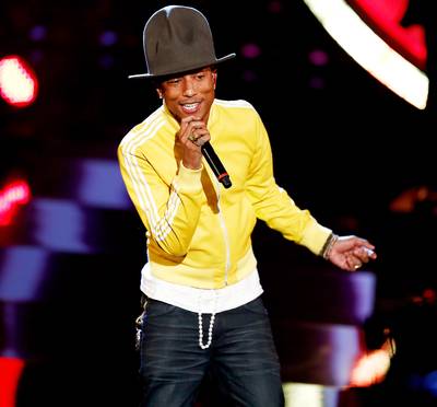 &quot;Happy,&quot; Pharrell Williams - Pharrell's #1 hit is one to put into rotation during this festive time of the year, when the last exams have been taken and the prize is finally within reach.&nbsp;(Photo: Andreas Rentz/Getty Images)