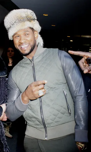 Hot Head - Usher shows off that million dollar smile while wearing a Davey Crockett style fur hat to keep warm at the&nbsp;Today show in New York City.&nbsp;(Photo: Fortunata / Splash News)