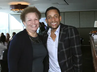 Chairman of the Board - BET Networks Chairman and CEO Debra Lee&nbsp;poses with actor and fellow Harvard graduate Hill Harper.&nbsp;(Photo: Maury Phillips/BET Networks)