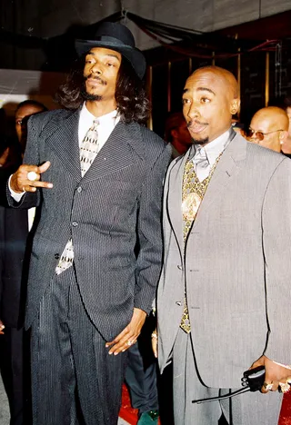 Deathrow Spokespersons  - Let's keep it real! Snoop and Pac hit their peaks of fame under Death Row Records and it skyrocketed the hip hop dream team to became generational icons. They took over the carpet at the 1996 MTV Music Awards, which was Tupac's last appearance on MTV before his tragic death. (Photo: Chris Connor / WENN)