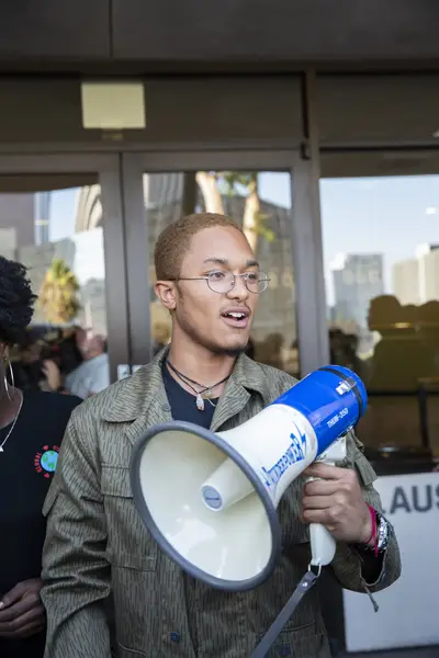 Students Deserve activist Justin Scott joins other activists. - (Photo: Dale Berman/BET)
