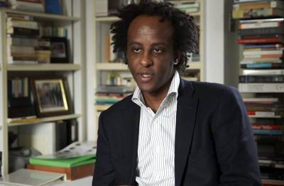 Dinaw Mengestu - Dinaw Mengestu, 34, won a MacArthur Genius grant in 2012 for his novels and non-fiction writing about life in Sub-Saharan Africa. On writing about the African Diaspora: ?I remember very early on being told stories of minorities, Africans especially, are never going to sell. You can try to do so anyway,? he told BET.com. ?Of course, I think it probably has some validity to it, but I wouldn't want to write about anything else.?  (Photo Courtesy MacArthur Foundation)