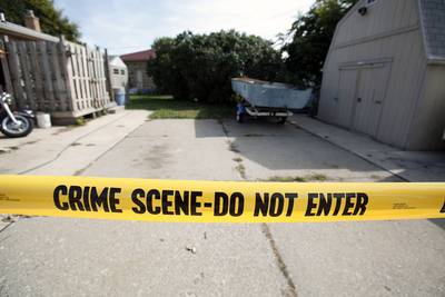 Crime - Although officials say overall crime fell by 2.63 percent in 2012, last year marked Detroit’s deadliest year in decades, with homicides topping 400.&nbsp;(Photo: Bill Pugliano/Getty Images)