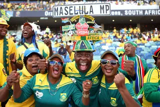Crowd Goes Wild - South Africa fans cheer during the match between South Africa and Angola on Jan. 23. South Africa dominated Angola 2-0. (Photo: Steve Haag/Getty Images)