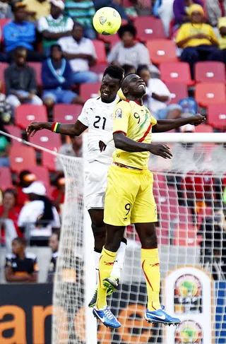 Ghana vs. Mali - John Boye of Ghana and Cheik Tidiane Diabate of Mali go head to head on Jan. 24 in Nelson Mandela Staduim. Ghana took the match 1-0. (Photo: Michael Sheehan/Gallo Images/Getty Images)