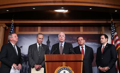 Gang of Eight, Plus One - In a rare show of bipartisanship, a group of eight senators introduced this week a blueprint for comprehensive immigration reform. Obama supports the effort and said that &quot;now is the time&quot; to fix the broken system.&nbsp;  (Photo: Alex Wong/Getty Images)